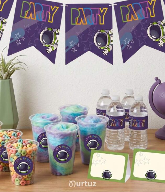 Space themed party printables - featuring purple galaxy banners, water bottle labels, and snack cup stickers. Space party printables by Nurtuz.